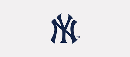 Capital N overlaid with a capital Y in dark navy font.