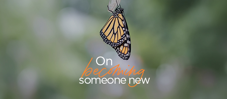 A monarch butterfly hangs delicately against a soft, green blurred background. The insect is shown in close-up, highlighting its orange and black patterned wings. Overlaid text reads "On becoming someone new" in white and orange script, suggesting personal growth and transformation. The overall composition feels calm and reflective, with a focus on change and renewal.