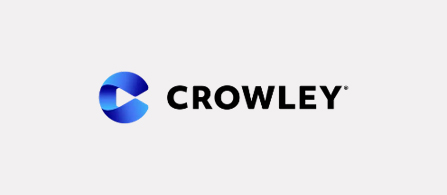 A logo centered on a light gray background. A blue circular emblem with a play-button-like cut sits to the left of bold black capital letters spelling “CROWLEY.”