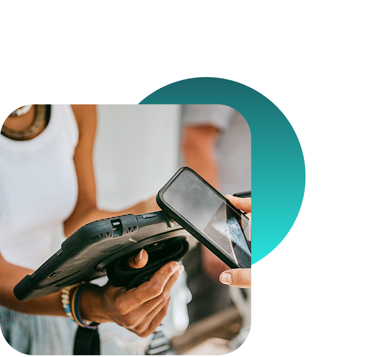 A close-up of two people completing a transaction by tapping a mobile phone against a tablet. 