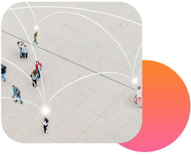 Two professionals having an animated discussion on an elevated walkway. 