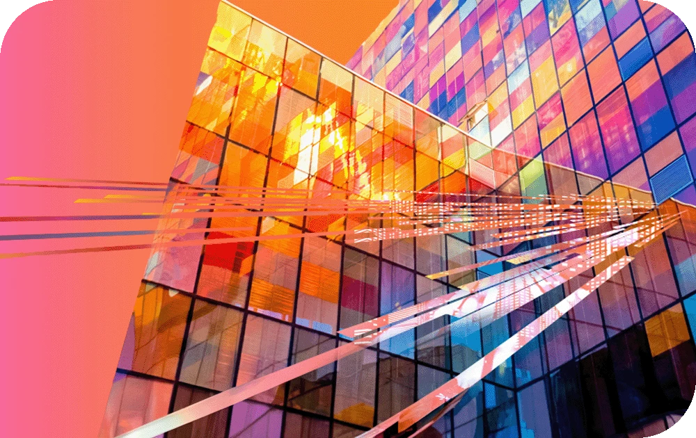 An abstract upward view of a modern glass skyscraper whose angled windows reflect a vivid rainbow of orange, pink, purple, blue, and yellow. Thin diagonal light streaks cross the facade. A pink-to-orange gradient frames the upper-left corner of the image.
